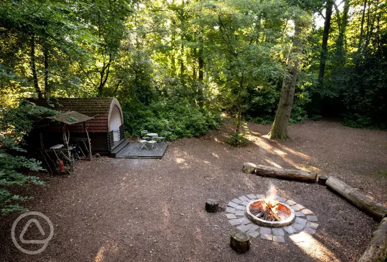 Aerial view camping pod and fire pit