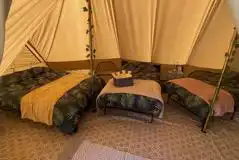 Deluxe bell tent beds Deluxe bell tent beds