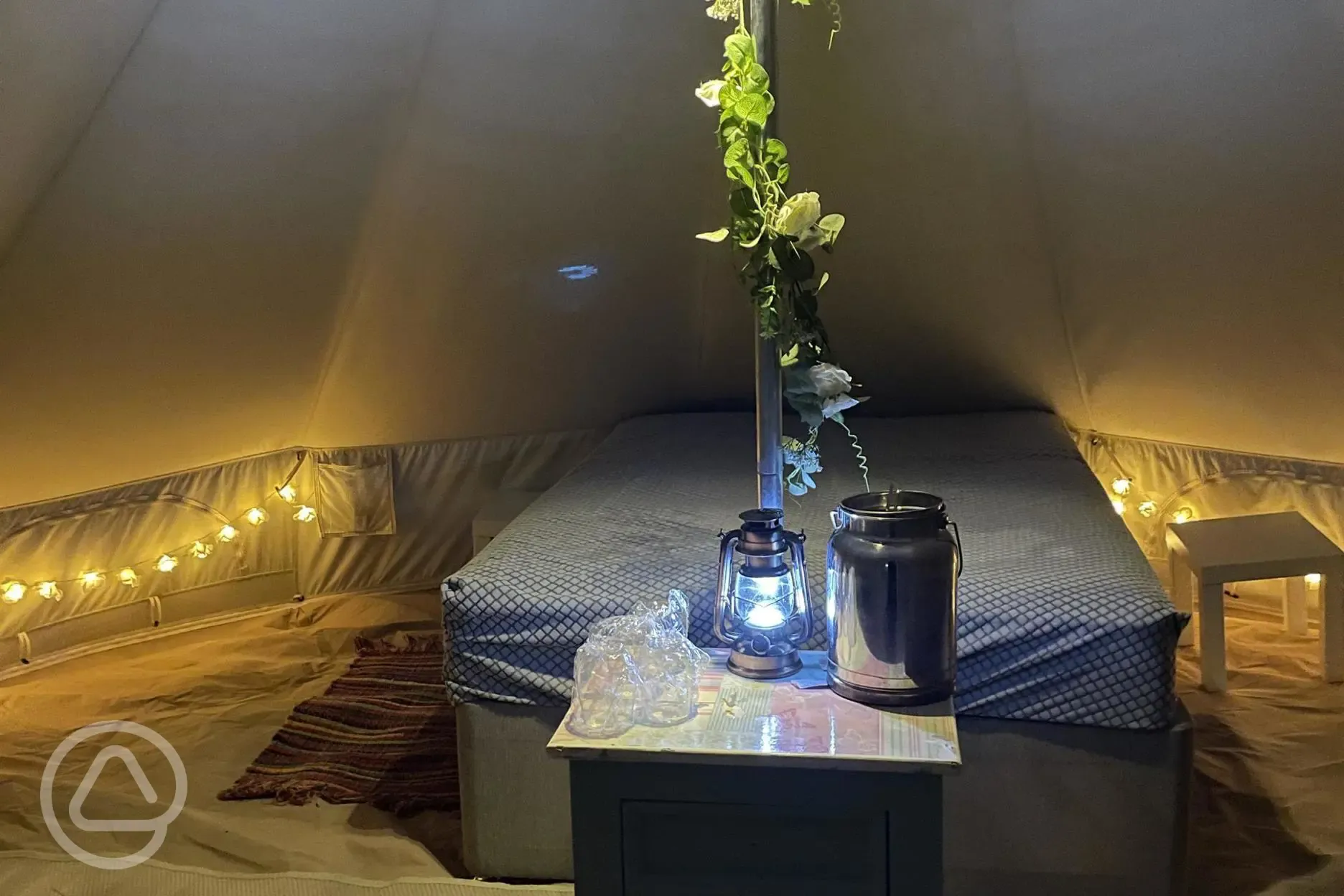 Bell tent interior at night