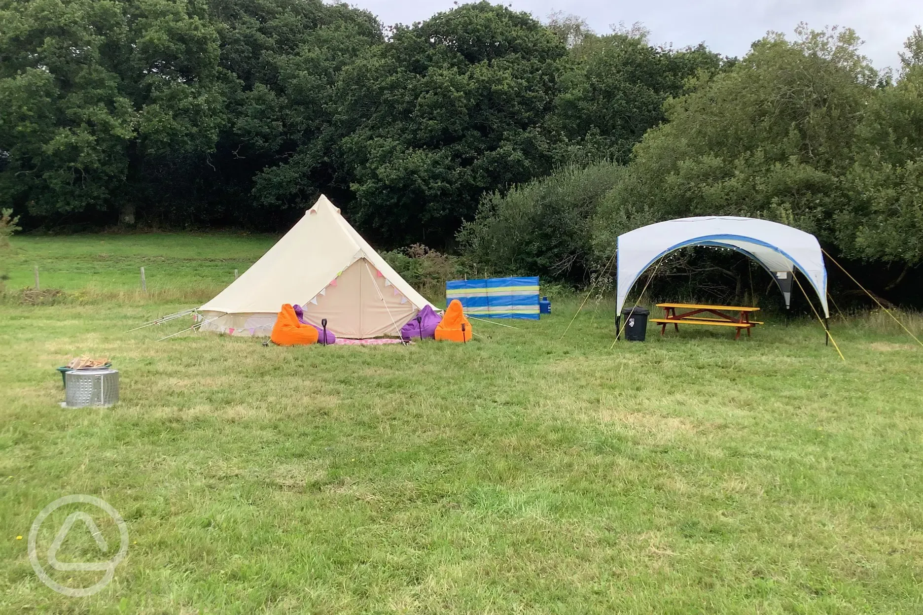 Bell tent and outdoor dining area