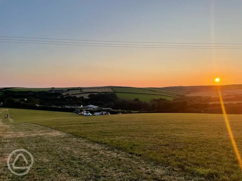 Camping field at sunset