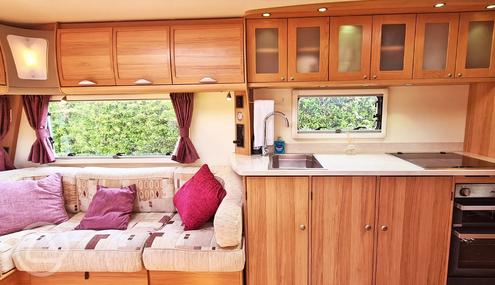 Touring caravan kitchen and seating area