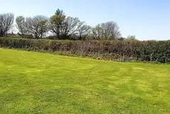 Non electric grass pitches with access to a shared water hook up