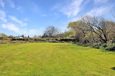 Non electric grass pitches measuring 6m by 6m at Roey's Retreat Campsite