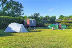 Non electric grass tent pitches