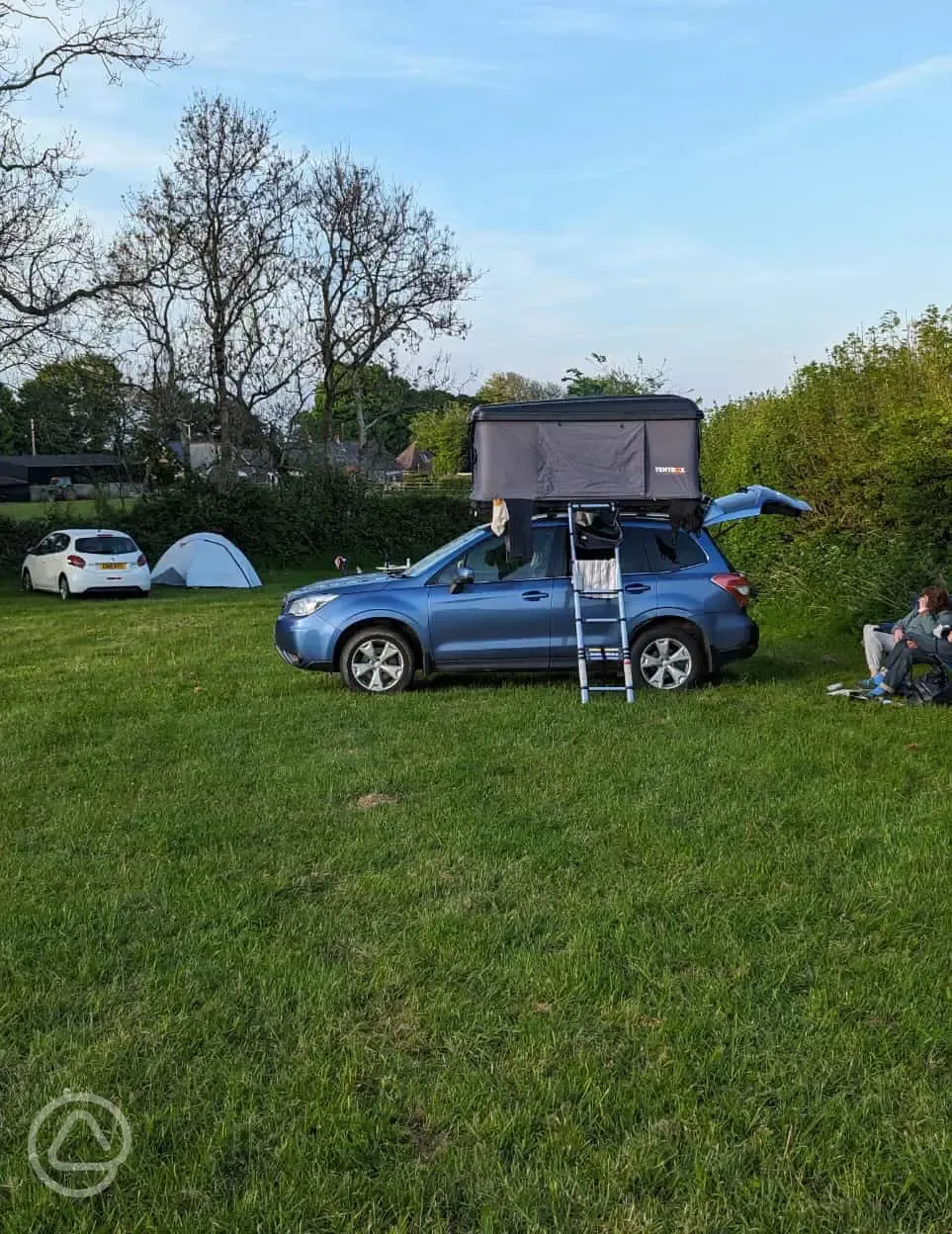 Non electric grass tent pitches