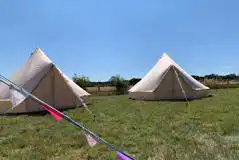 Bell tents with bunting at Summers Camping