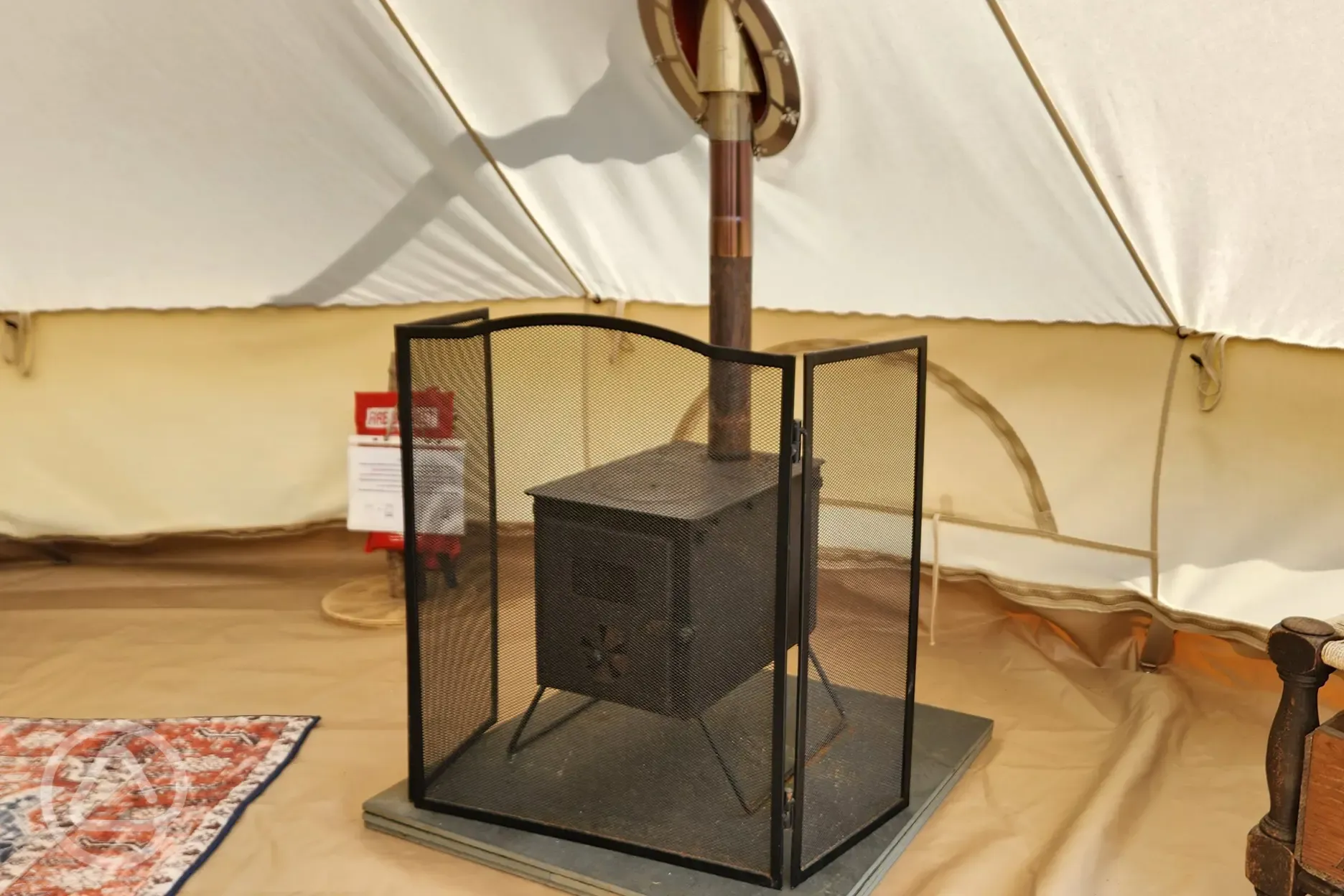 Bell tent with log burner
