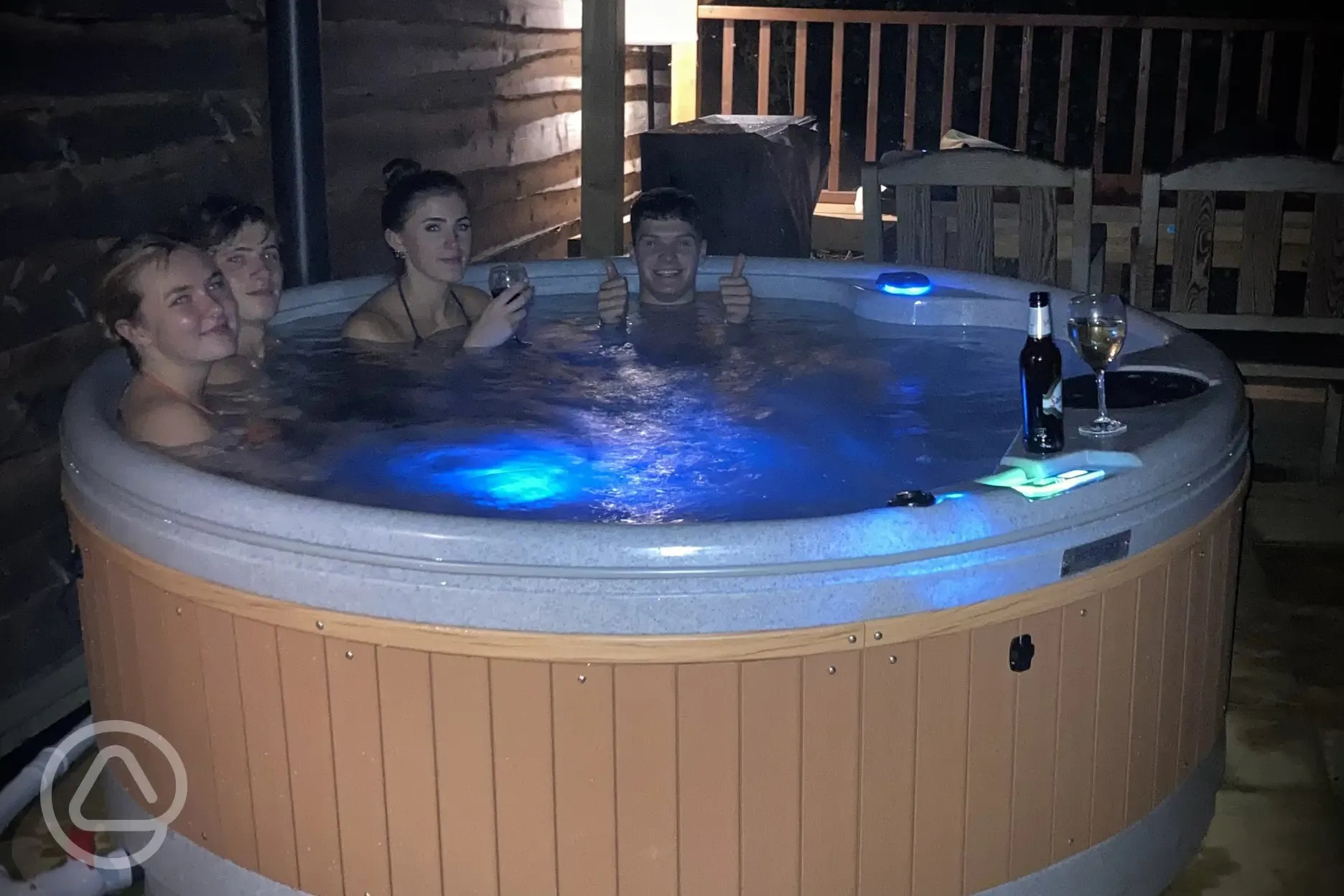 Stag lodge hot tub at night