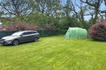 Grass tent pitches with optional electric