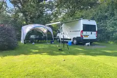 Hardstanding and grass pitch with optional electric (5m x 5m) Hardstanding and grass pitch with optional electric (5m x 5m)