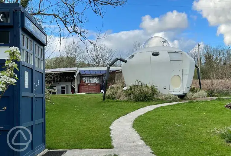 Spodnic UFO camping pod with Tardis bathroom at Melin Mabes