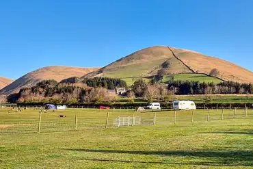 Grass mesh pitches, surrounded by farmland