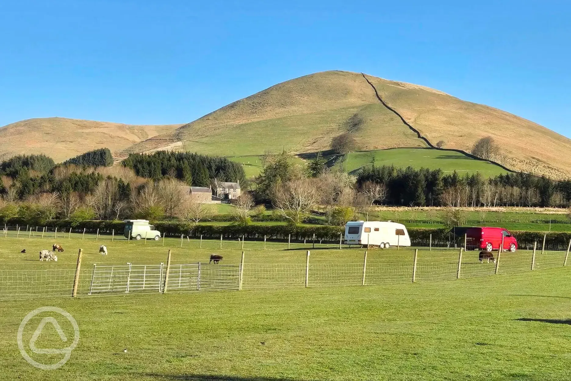 Grass mesh pitches, surrounded by farmland