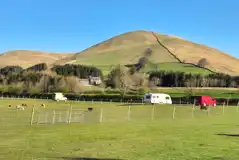 Grass mesh pitches, surrounded by farmland