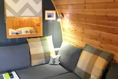 Pod lounge area with sofa Pod lounge area with sofa