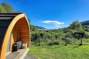 External of decking area and views from Colite Glampod towards Loch Ness