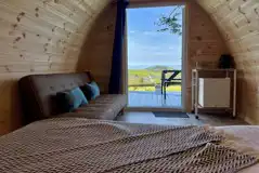 View from inside the camping pod with sea views 