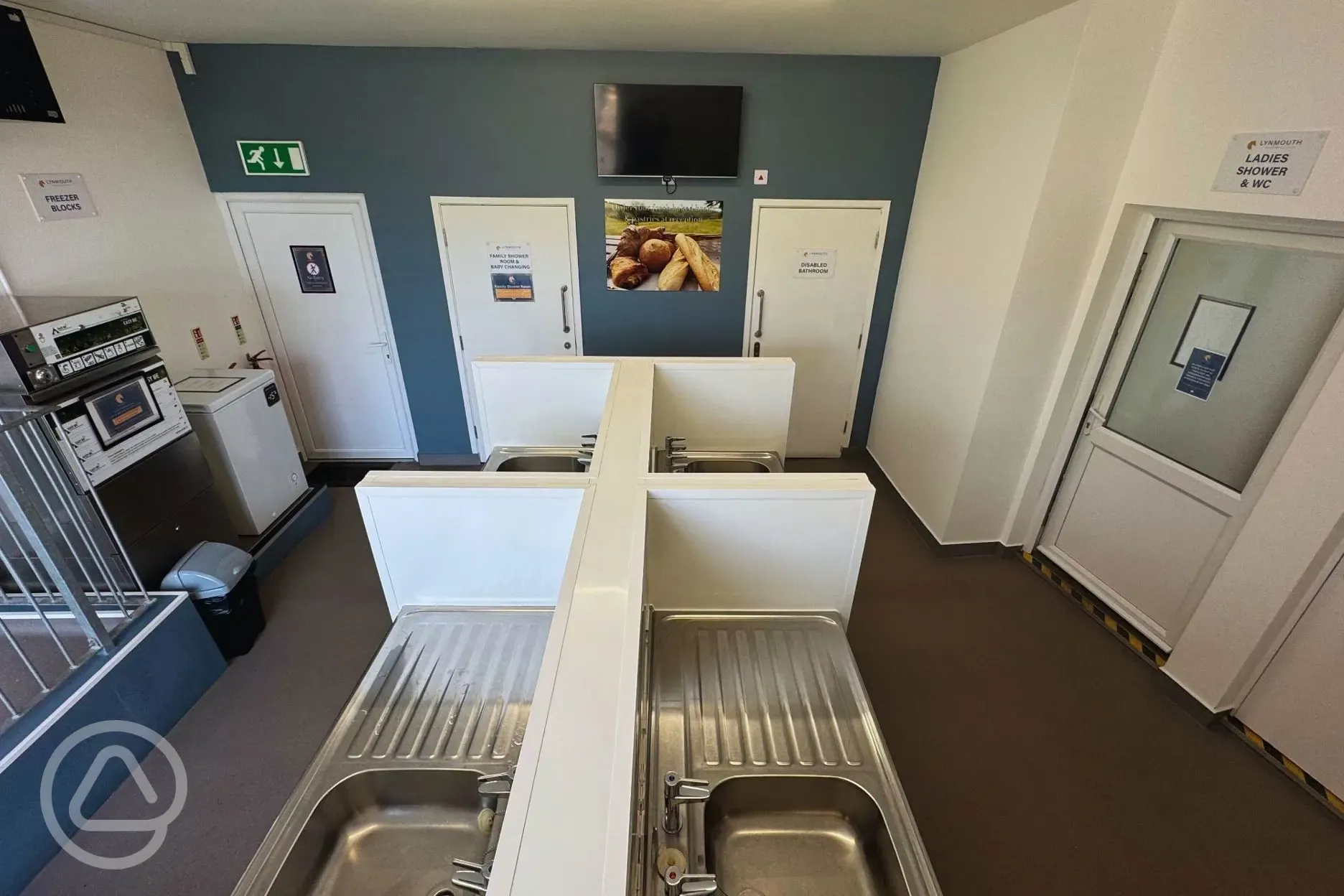 Indoor washing up and laundry room with eco friendly dishwashwer