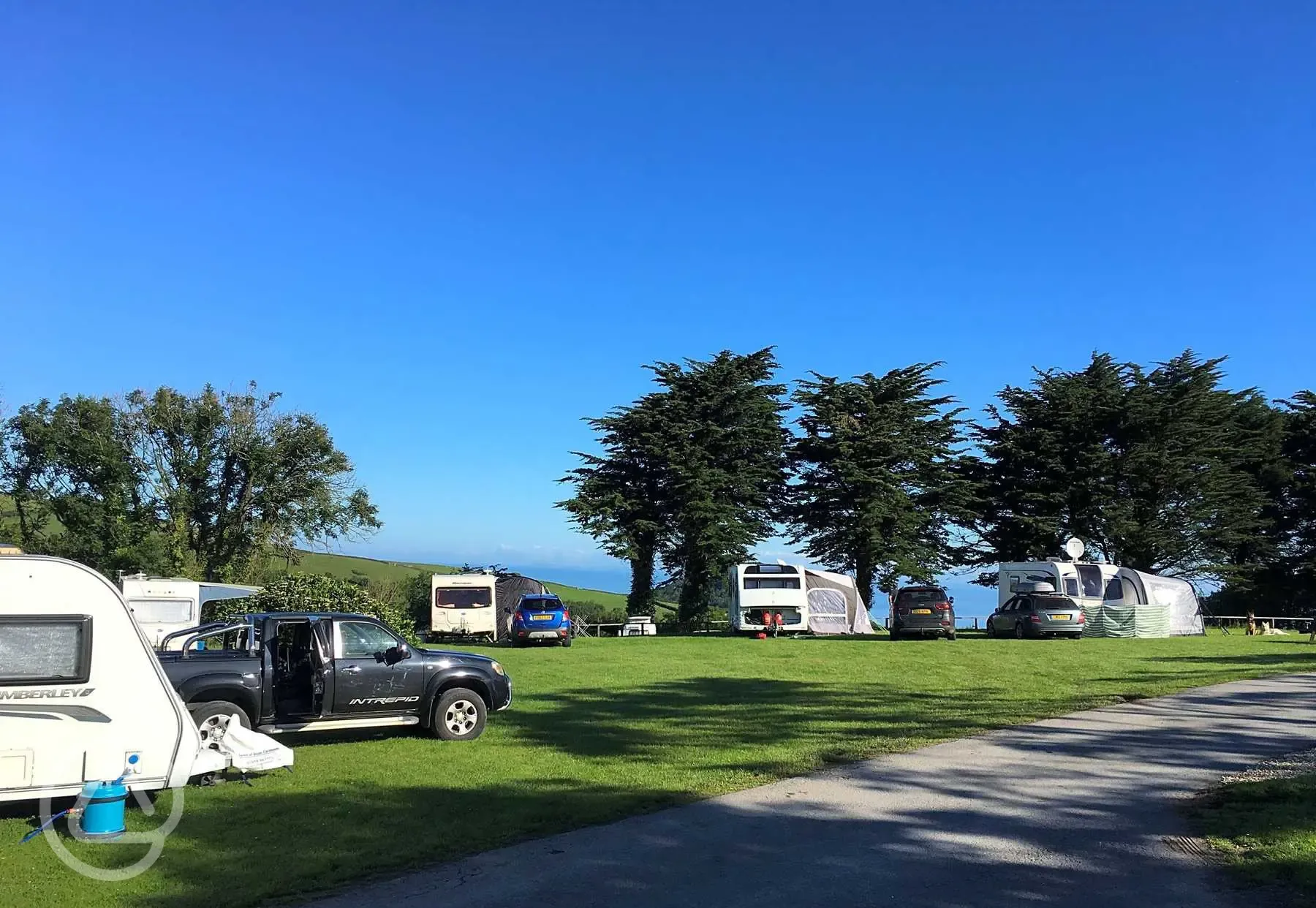 Tourers with awnings on The View Large Serviced Hardstanding Pitches