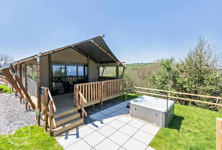 Safari tent with a decking area and hot tub