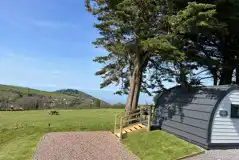 Camping pod at Lynmouth Holiday Retreat with sea views towards Lynmouth Bay