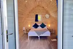 Double bed inside the camping pod with sea views (bedding included)