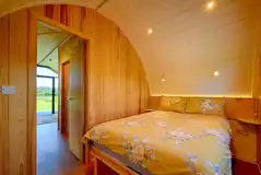 Separate double bed in the Enterber deluxe glamping pod Separate double bed in the Enterber deluxe glamping pod