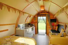 Kitchenette and seating area in the Smardale ensuite glamping pod Kitchenette and seating area in the Smardale ensuite glamping pod
