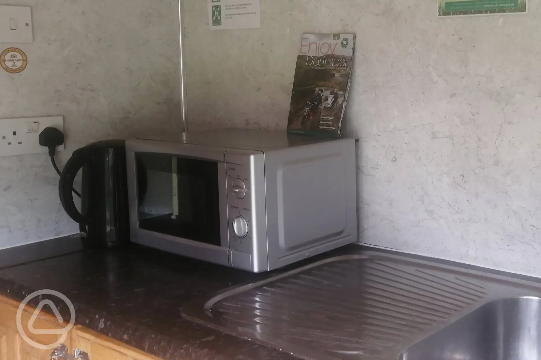 Microwave and kettle in campers' kitchen