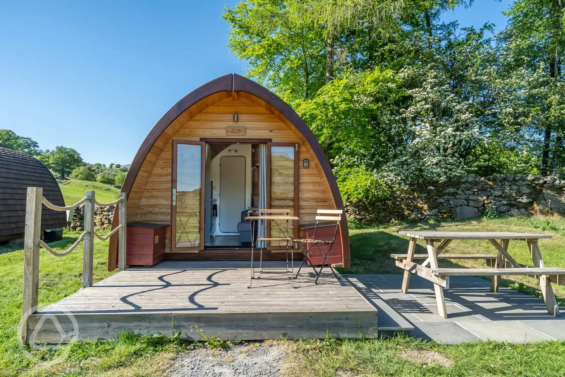 Glamping pod and outdoor seating area