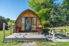 Glamping pod and outdoor seating area Glamping pod and outdoor seating area