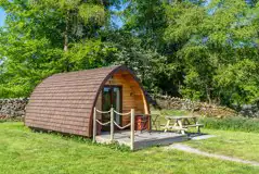 Glamping pod and outdoor seating area Glamping pod and outdoor seating area