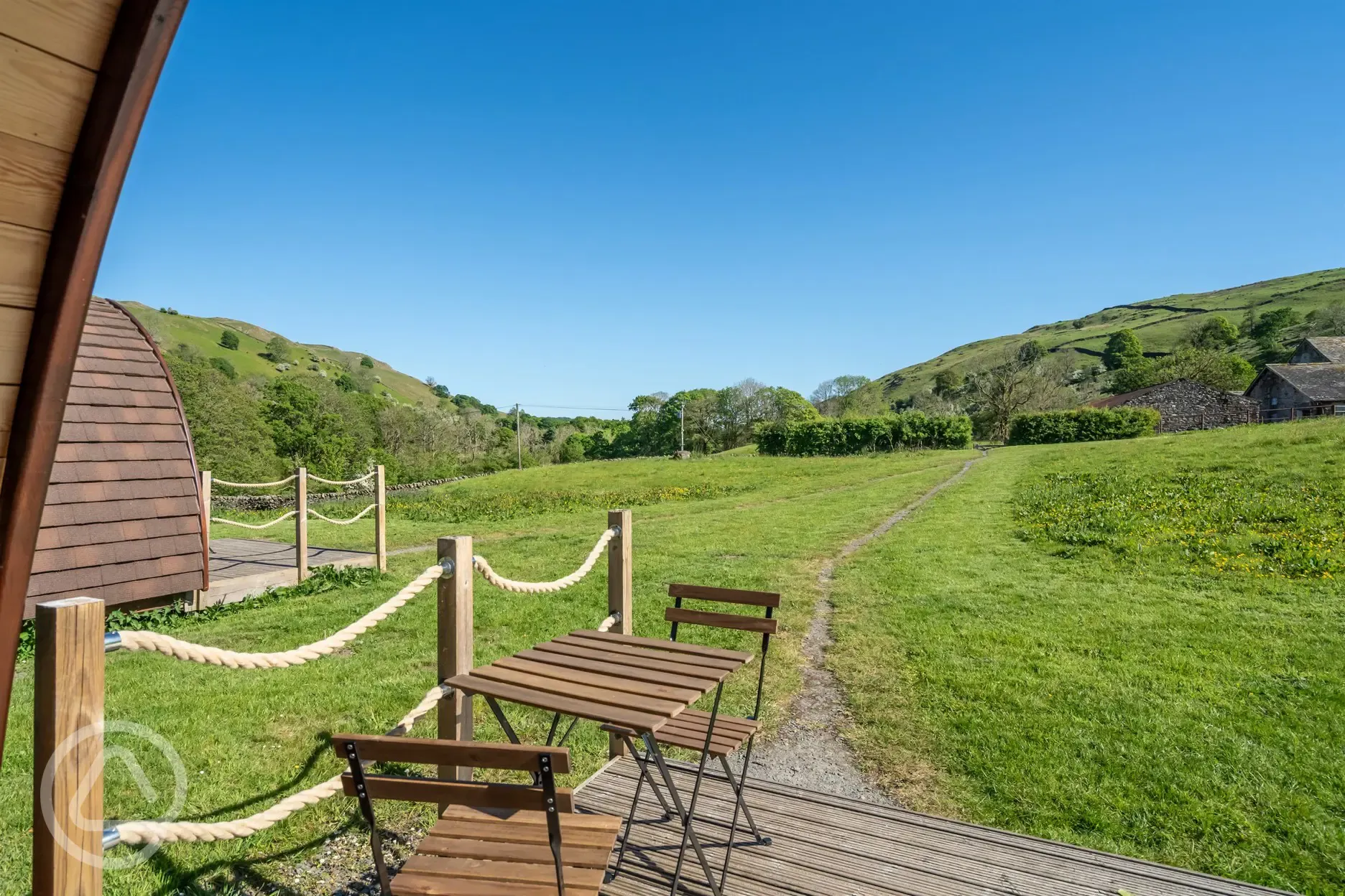 Glamping pod outdoor seating area and views