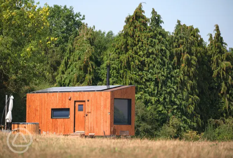 Fox glamping cabin with a wood-fired hot tub and countryside views