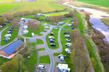Aerial of the site and Wick River