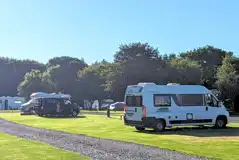 Grass 3m x 8m pitches with 16 amp electric hook ups