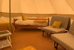 Additional beds in the bell tents Additional beds in the bell tents