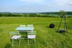 Bell tent outdoor seating area and fire pit