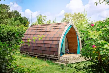 Bumblebee glamping pod with a small deck