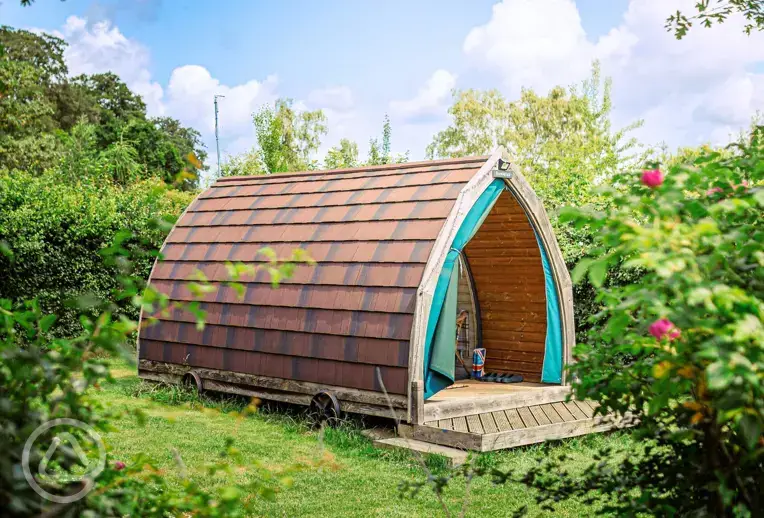 Bumblebee glamping pod with a small deck