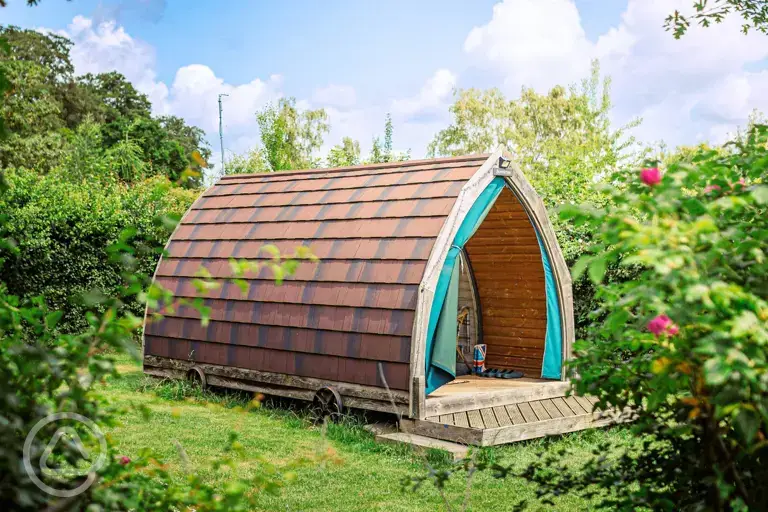 Bumblebee glamping pod with a small deck