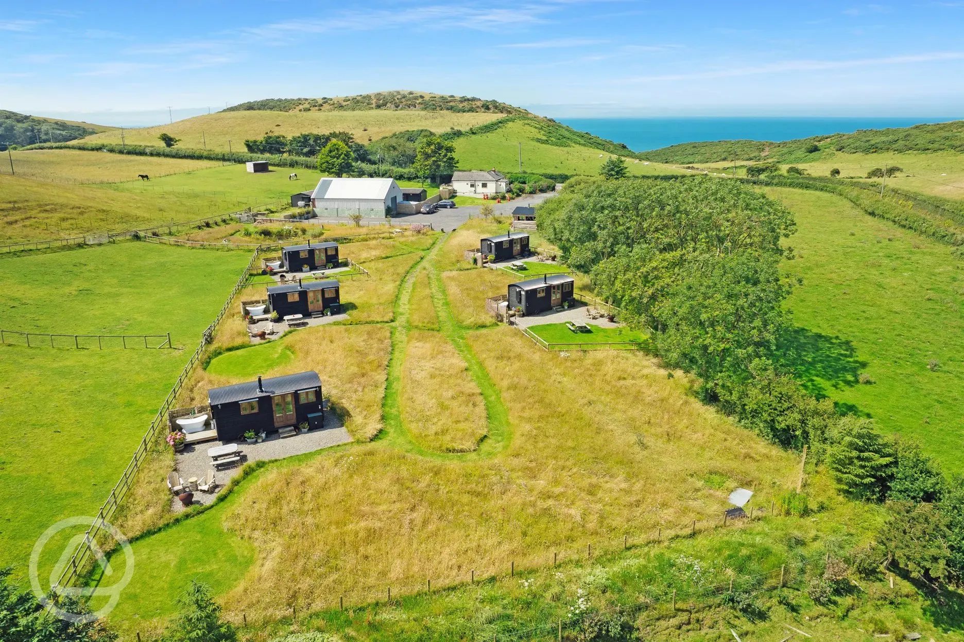 Aerial of the site with sea views