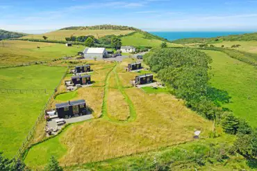 Aerial of the site with sea views