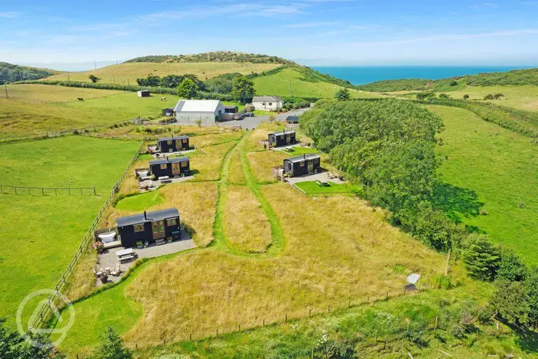 Aerial of the site with sea views