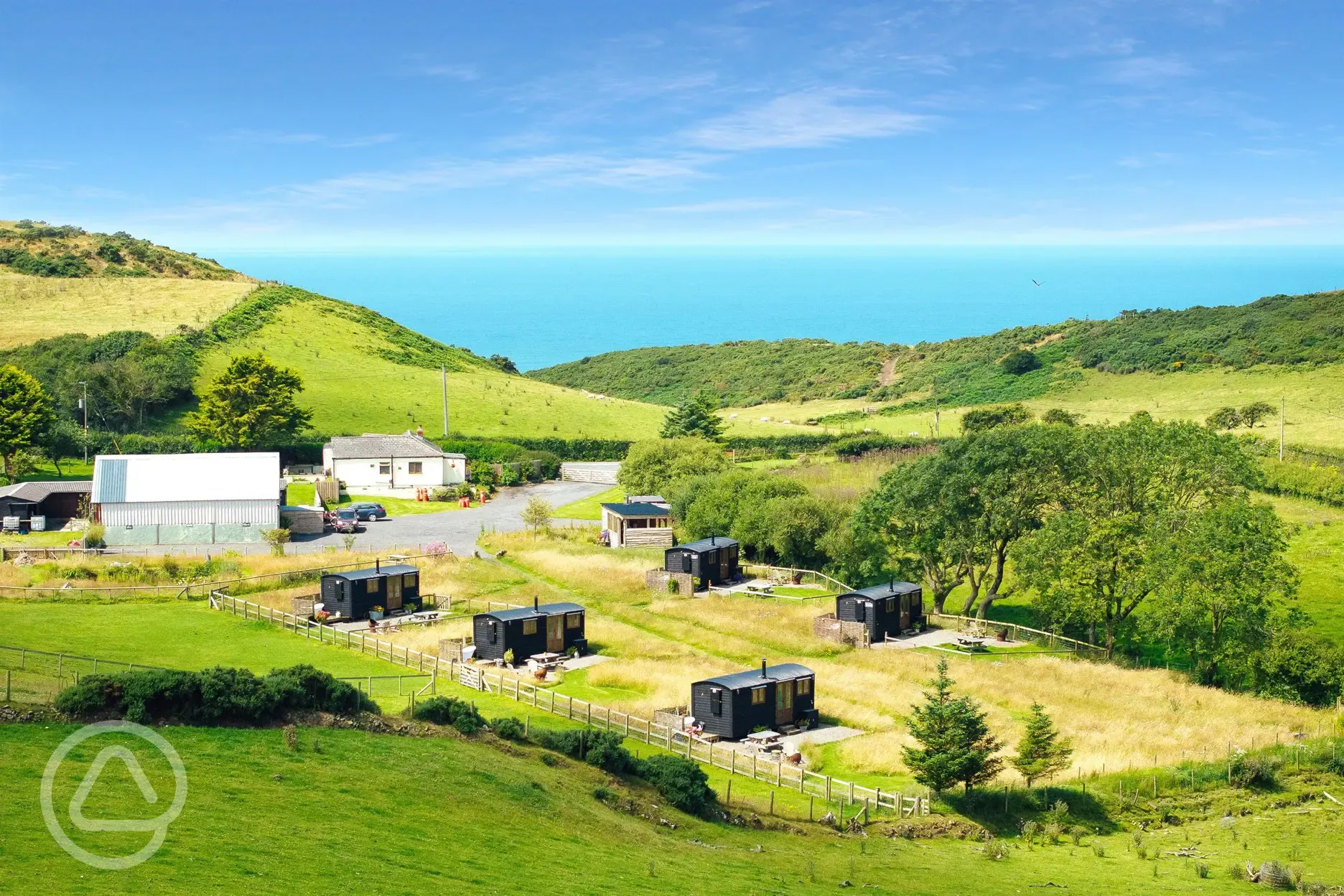 Aerial of the site with sea views