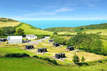 Aerial of the site with sea views