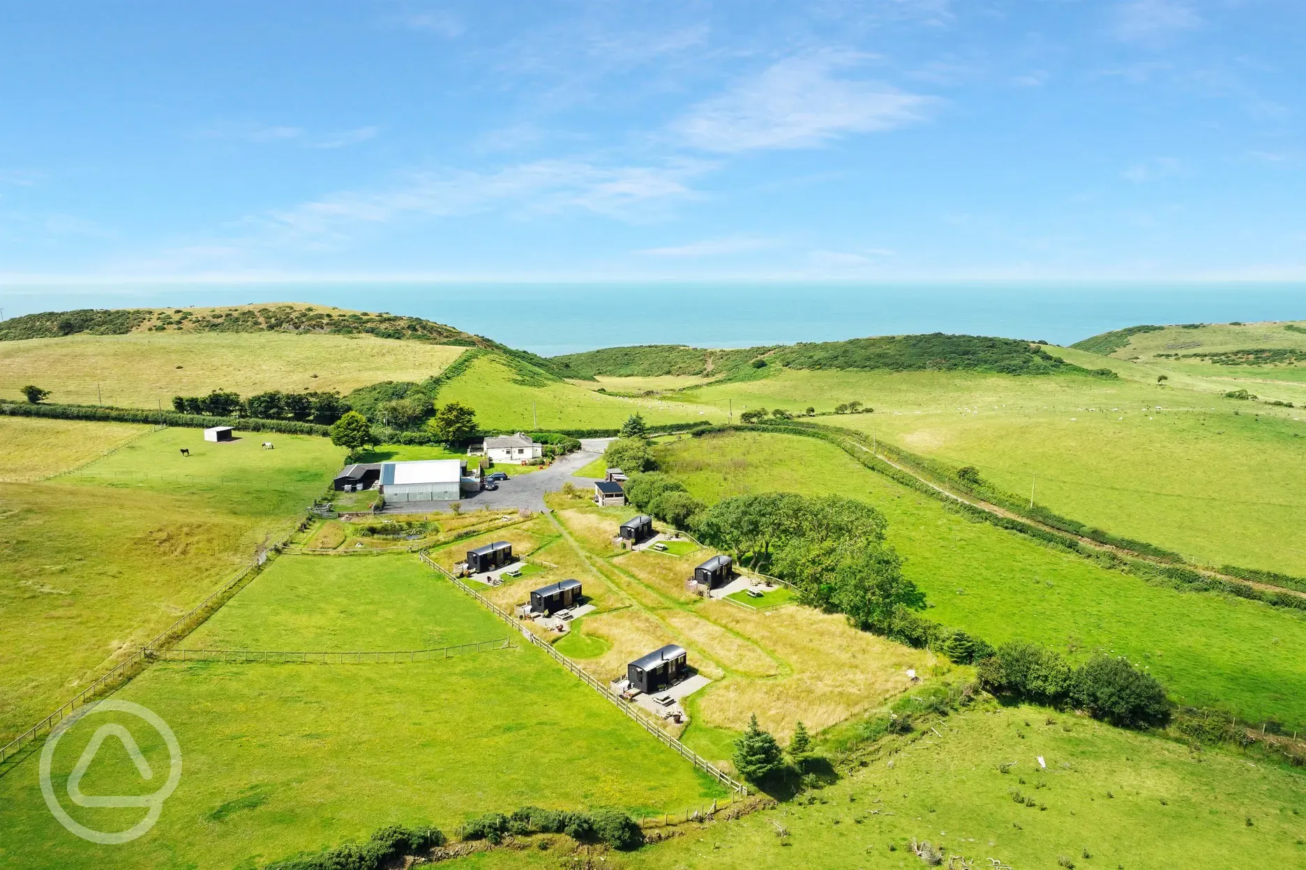 Aerial of the site with sea views