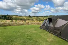 Electric hardstanding and grass ensuite pitch (Medlyn Meadows)
