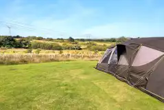 Electric hardstanding and grass ensuite pitch (Medlyn Meadows) Electric hardstanding and grass ensuite pitch (Medlyn Meadows)